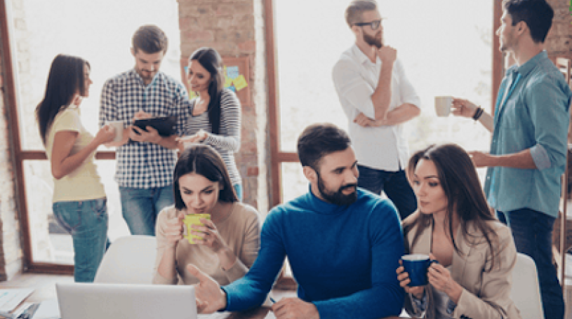 Group of employees talking and interacting